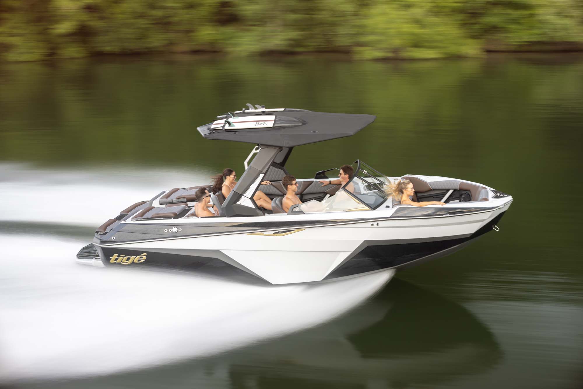 Tigé boat cruising on a lake